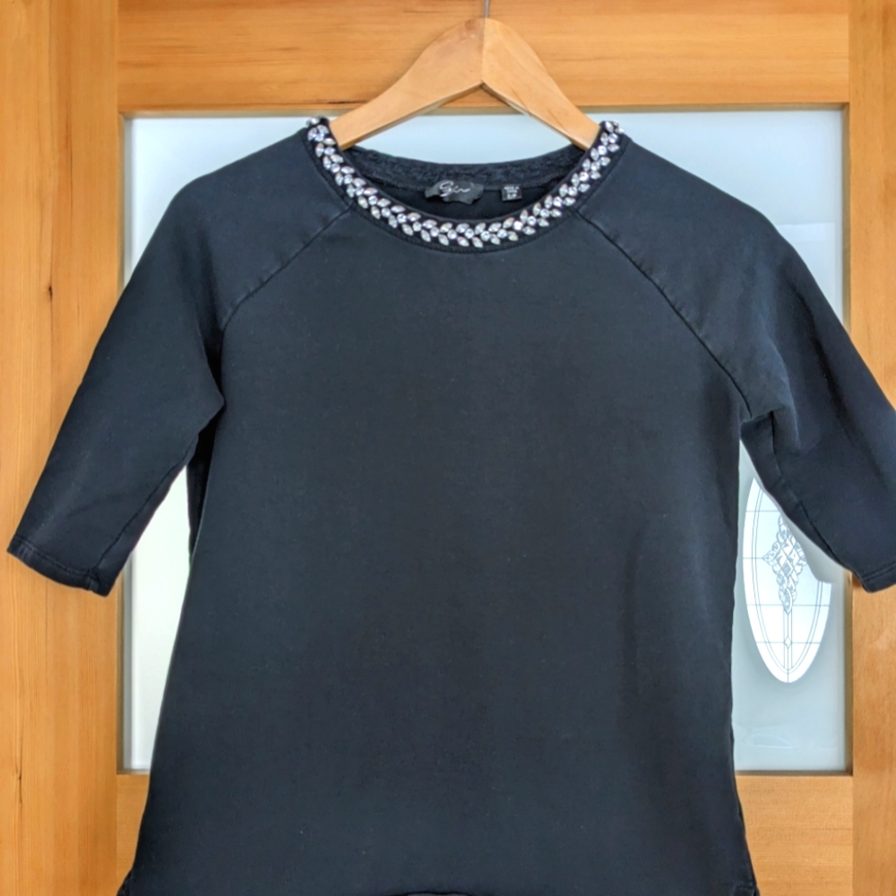 Black bejeweled elbow length top